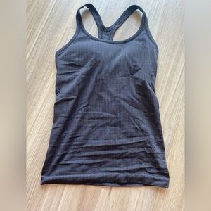 Black. Lululemon. Ebb to street tank. Ribbed. Size 6